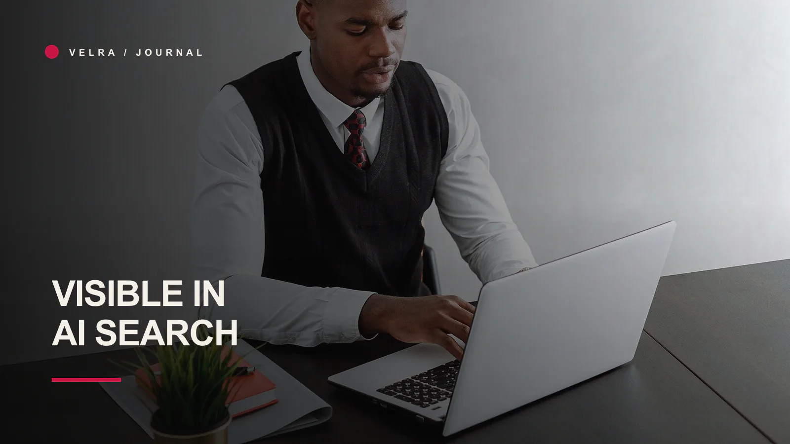 Business owner researching information on a laptop in a modern office